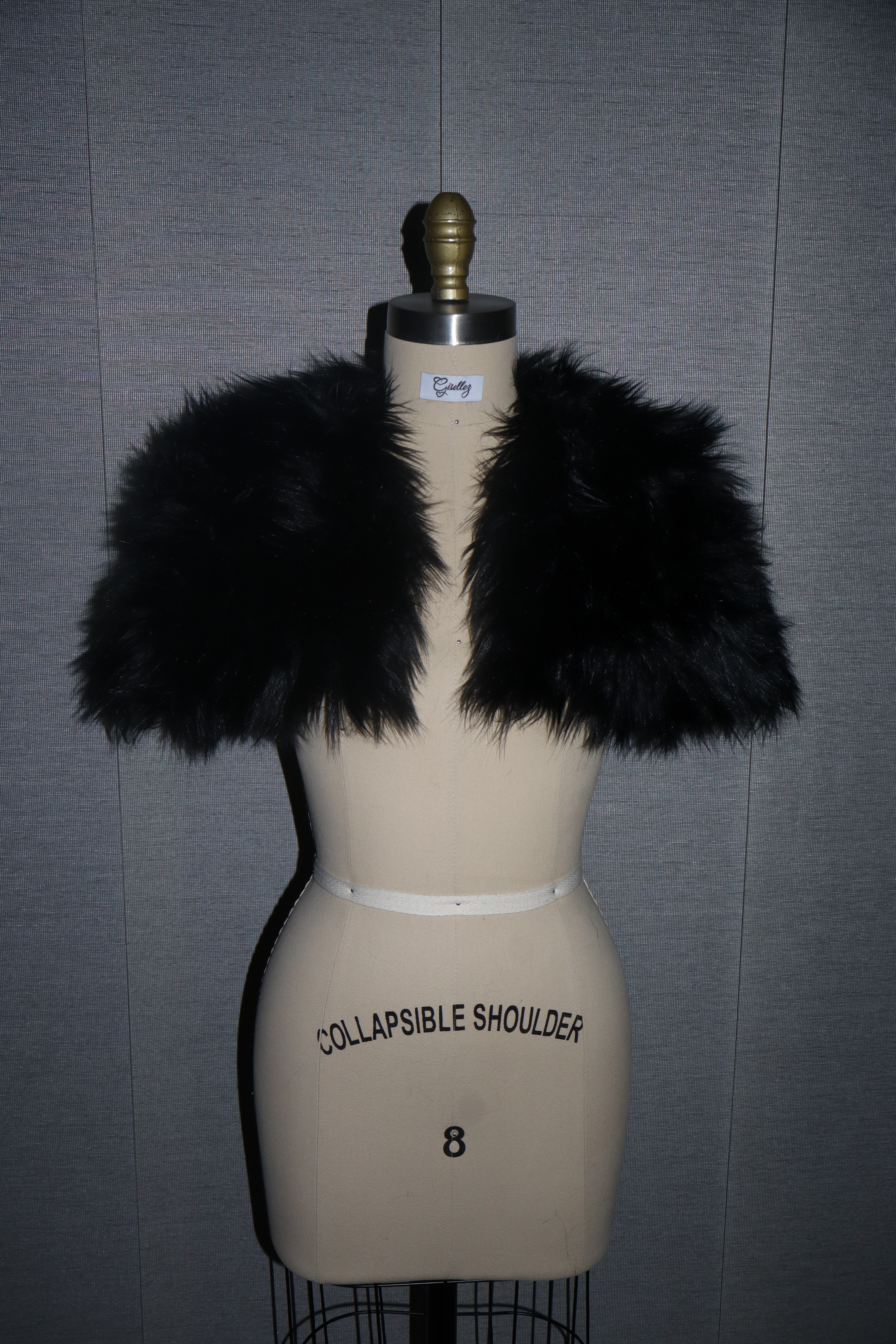 Faux Fur Shrug In Black